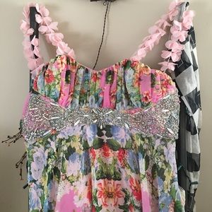 Long flowered formal dress with added sleeves